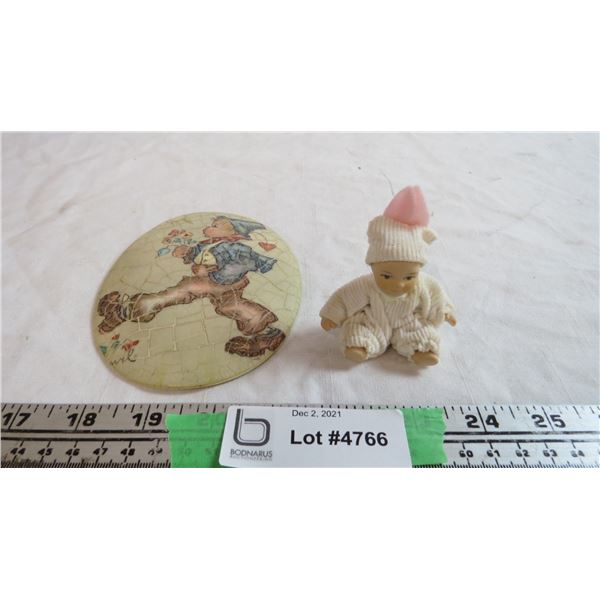 small doll + decorative item