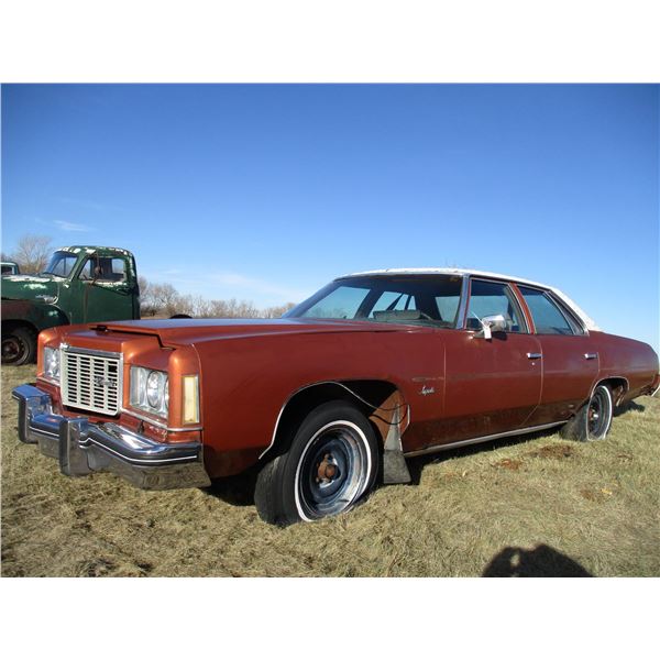 REMOTE PICKUP IN TUGASKE, SK - Chevrolet 1975 Impala Four Door Sedan with 400 small block motor
