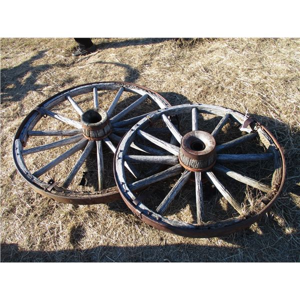 REMOTE PICKUP IN TUGASKE, SK - Two Wooden Wagon wheels - 39"   47" diameter