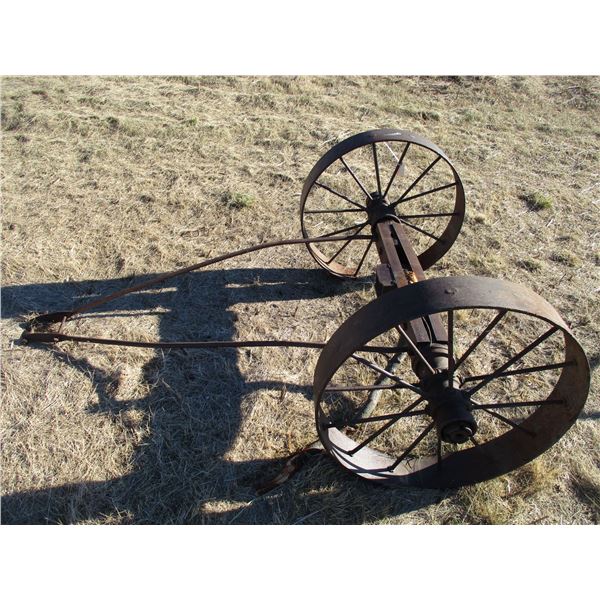 REMOTE PICKUP IN TUGASKE, SK - Pair of iron wheels on axle with hitch - 29" diameter