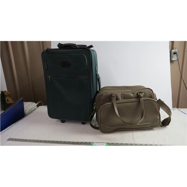 Buxton travel luggage on castors + other luggage
