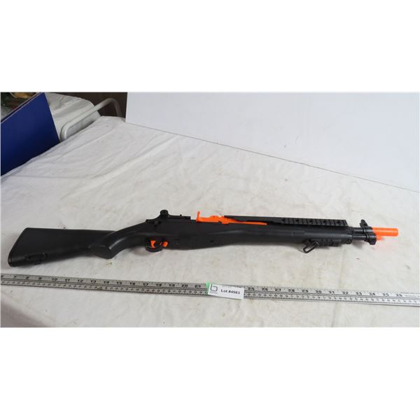 black and oragne toy rifle - makes sound (working)