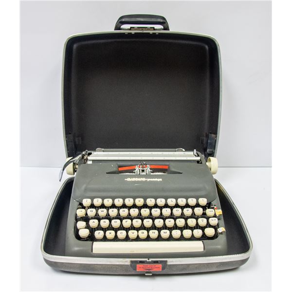 1950S EATONS PRESTIGE PORTABLE TYPEWRITER IN CASE