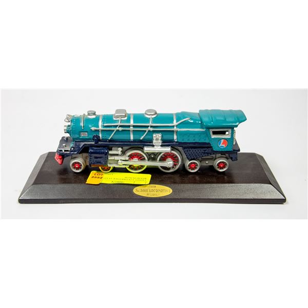 LIONEL LOCOMOTIVE STATUE ON WOOD PLINTH