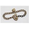 Image 1 : BRACELET WITH TINY HEART LOCKET AND KEY