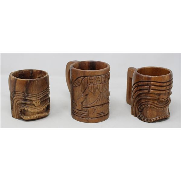 LOT OF THREE CARVED WOOD TIKI MUGS