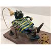 Image 2 : Character sculpture with display case of Gulpin & Mush Dog by artist Aktonn