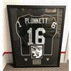 Image 1 : Jim Plunkett #16 Framed Jersey with the LA Raiders  Autographed with COA sticker.