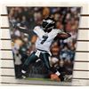 Image 1 : Michael Vick Autographed photo with COA Sticker from Michael Vick Sports Co. 16in x 20in