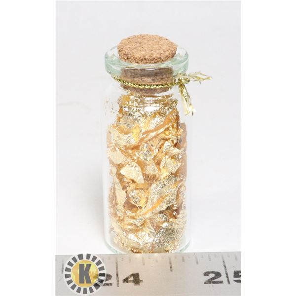 GLASS BOTTLE FILLED WITH GOLD FOIL