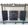 Image 2 : Tall Black Shelf with CD's & Sharp Stereo with Speakers
