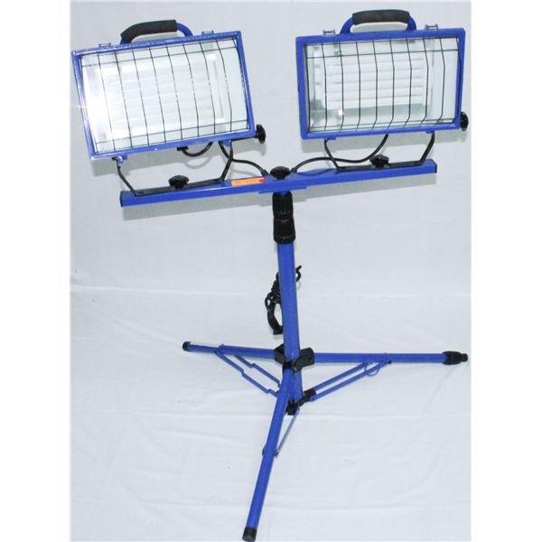PAIR OF WEATHER RESISTANT WORK LIGHTS ON STAND