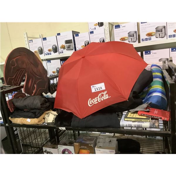 SHELF LOT OF ASSORTED ITEMS INCLUDING; COCA-COLA UMBRELLA, FIRST NATIONS ART, BOOKS, SCARF & MORE
