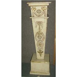 Carved wooden pedestal with lift top
