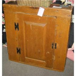 Pine cupboard with raised panel door