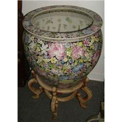 Large Oriental fish bowl on wooden stand