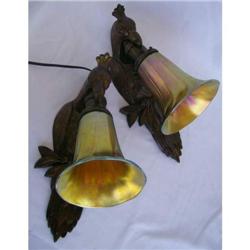 Pair of figural Parrot sconces with Steuben shades