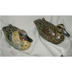 Two wooden decoy