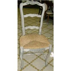 Pair of carved rush seat chairs