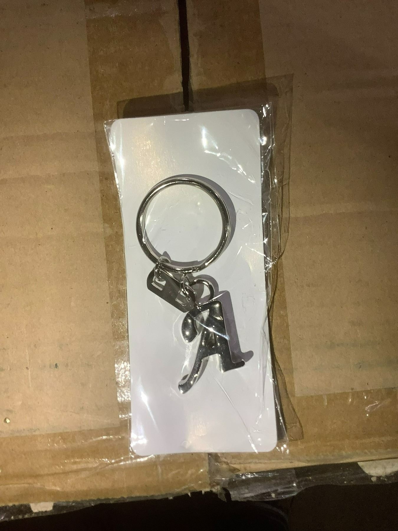 BOX OF 200 SILVER LETTER A KEYCHAINS