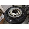 Image 2 : SET OF FOUR P205 75/R14 TIRES ON 5 BOLT 14" RIMS