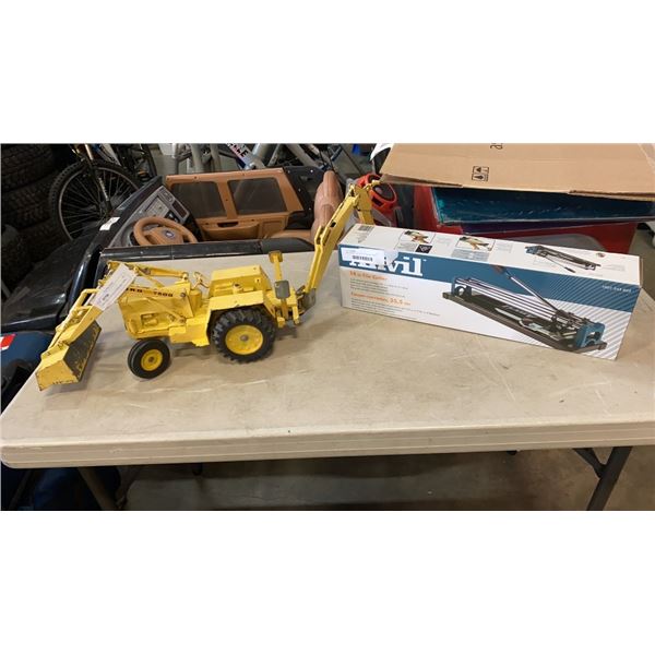 NEW ANVIL 14 IN TILE CUTTER AND FORD 7500 METAL BACKHOE/GRADER