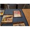 Image 3 : 5 MOUNTED VINTAGE WESTERN MOVIE ADVERTS FROMS 50'S, 60'S AND 70'S