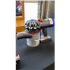 Image 2 : DYSON V7 MOTORHEAD CORDLESS VACUUM W/ ATTACHMENTS AND CHARGER RETAIL $399  - TESTED AND WORKING