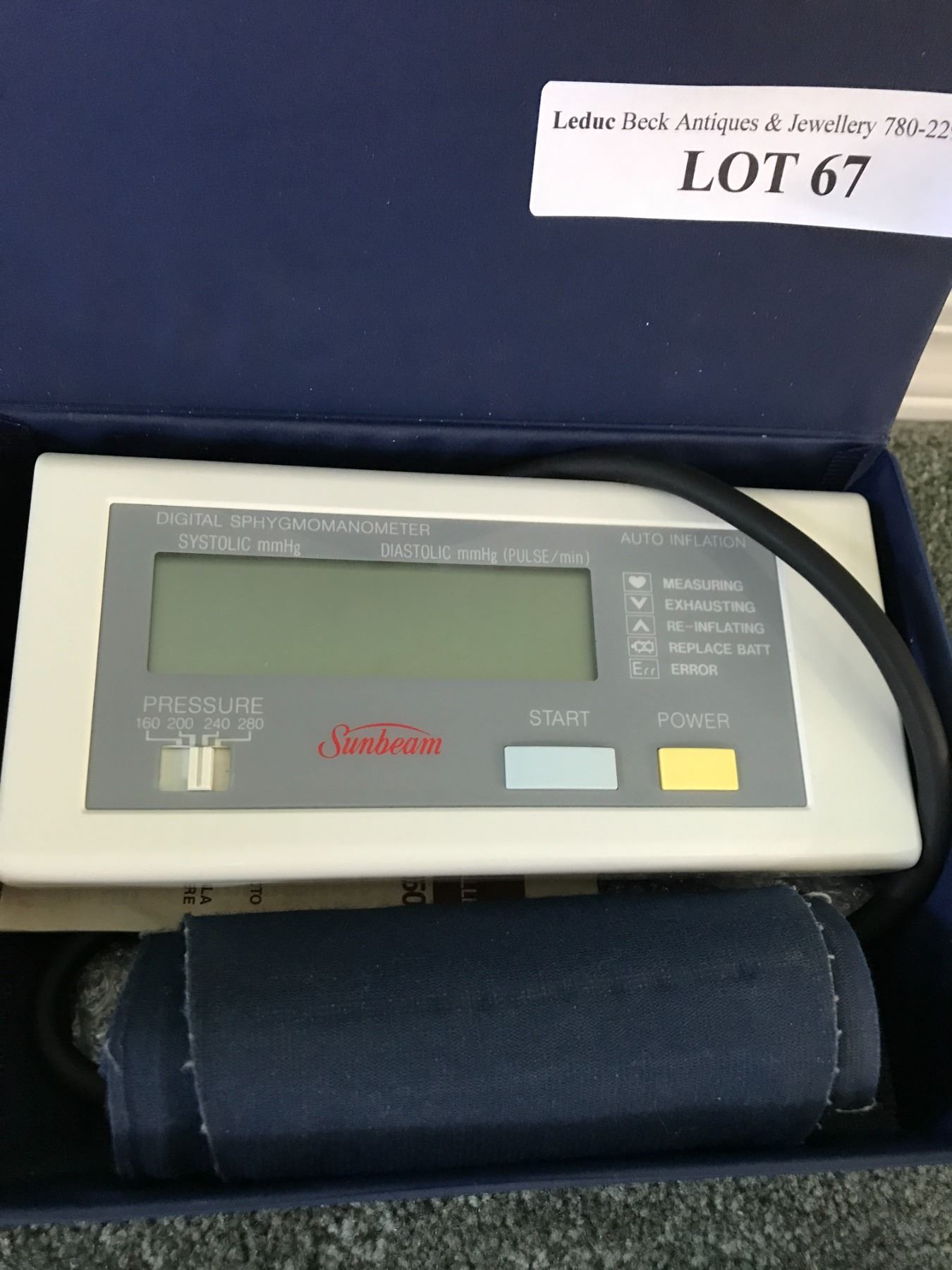 Omron blood pressure monitor; Sunbeam digital sphygmomanometer