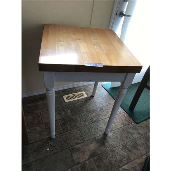 Butcher block table with painted wood legs