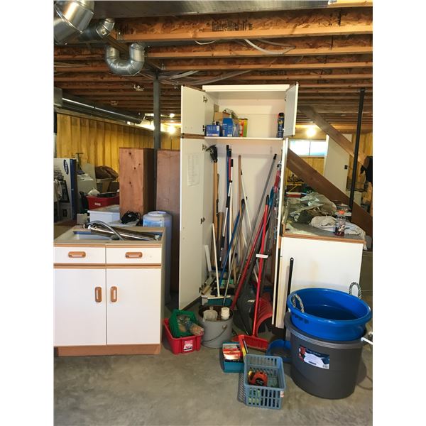 Utility Cabinet with household cleaning supplies, lightbulb, brooms, 2 large utility buckets, 2 draw