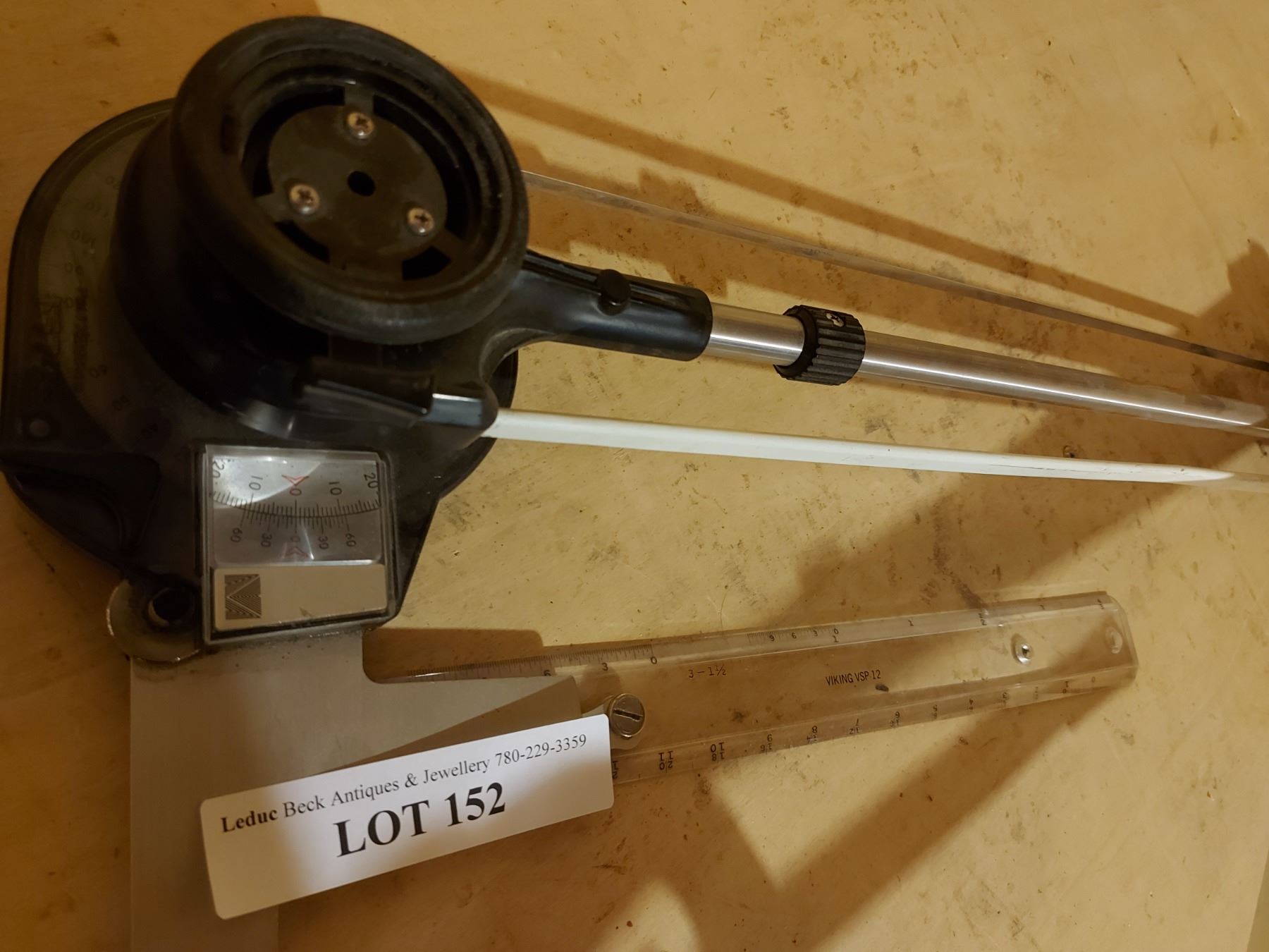 Drafting table arm with ruler