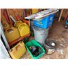 Image 1 : Metal cart (300 Kg), diesel jerry cans (x6), green weights (20 Kg), fencing, hand-held manual auger,