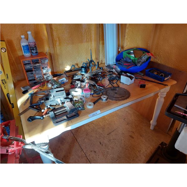 Wood-topped table, asst shop supplies incl. saw blades, fluorescent light fixture