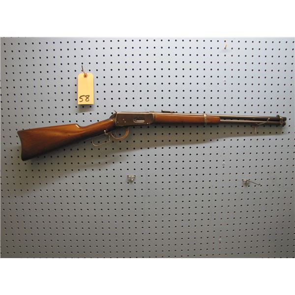 Winchester Model 1894; carbine; lever action .38-55 cal; saddle ring; 20" barrel; & vintage deerskin