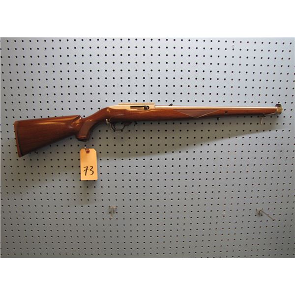 Ruger 10-22 semi auto 22LR, 18 ½” stainless steel bbl., factory adjustable sights, Checkered walnut