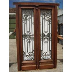 Beautiful double entry door with wrought iron #2392707