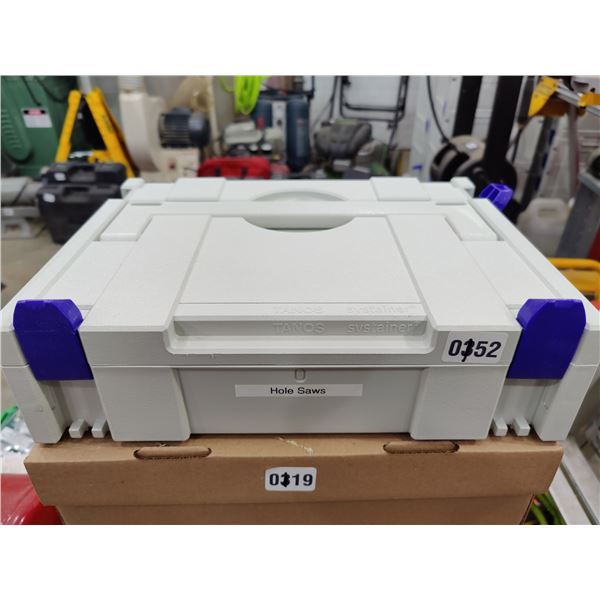 Container Full of Hole Saw Bits