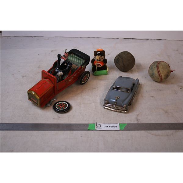Tin Buggy (damaged), car,Baseballs,A&W bear