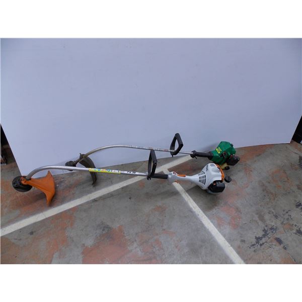 *pair of gas powered weed wackers
