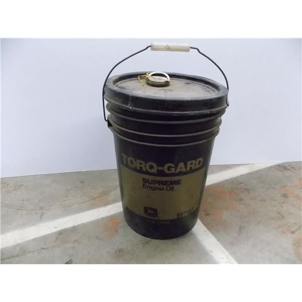 *John Deere oil bucket with ball of twine inside