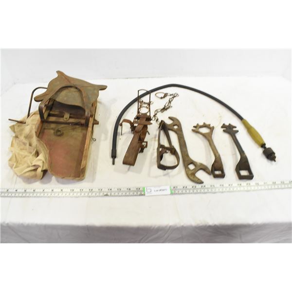 vintage seed spreader, animal traps, wrenches, misc