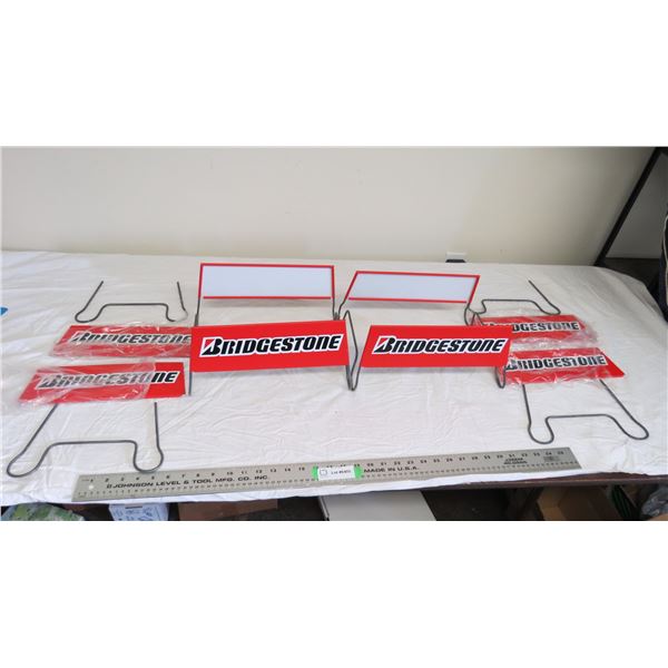 4X THE BID PRICE - Bridgestone store tire racks