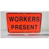 Workers present aluminum sign - 17.75x29.5
