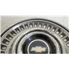 Image 2 : metal hub cap, plastic center caps + plastic chev grill (emblem?)