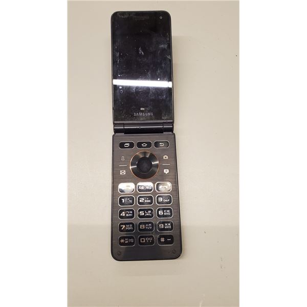 Vintage Samsung Flip Phone - no charger, doesn't power on