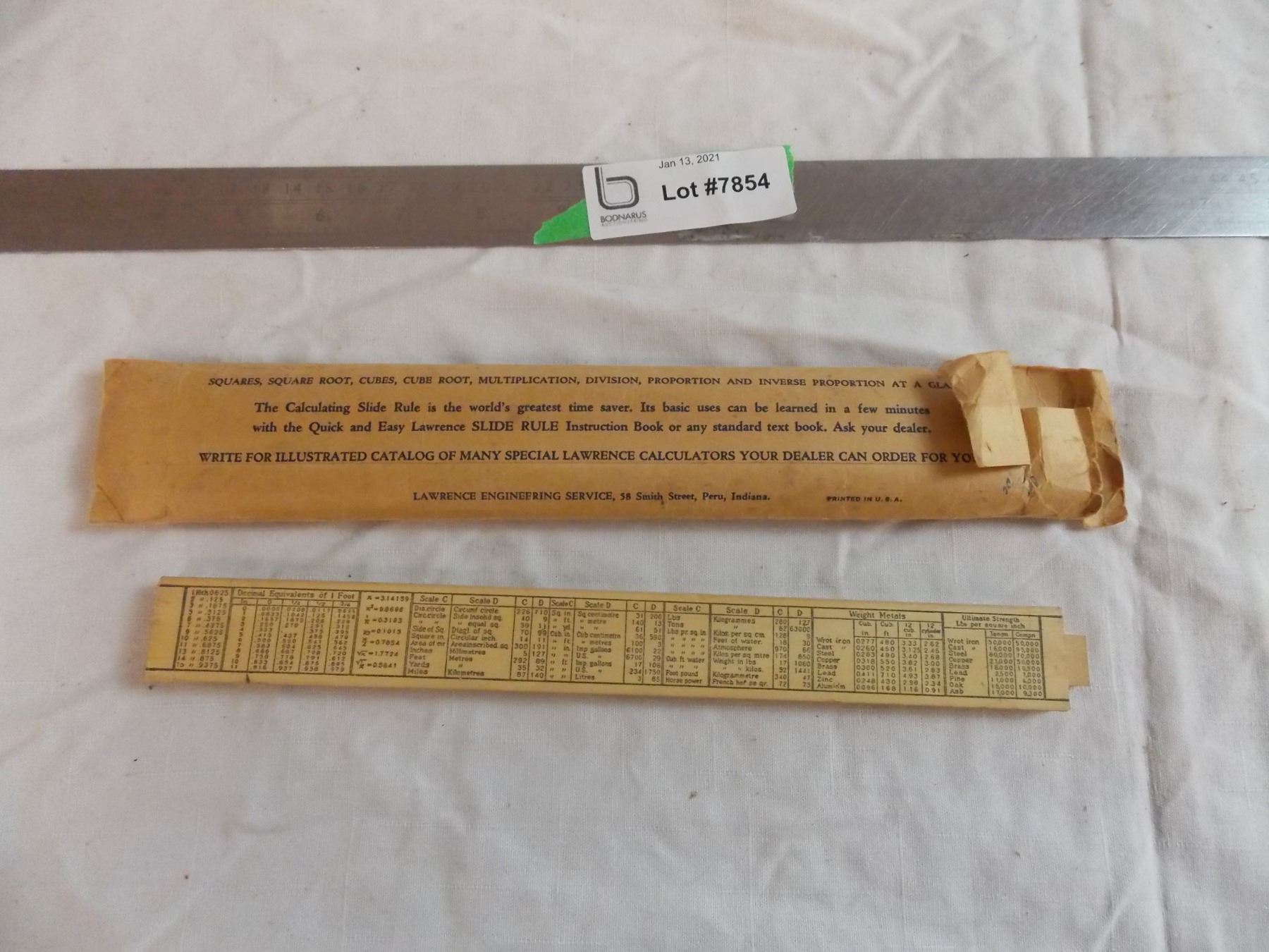 The original slide ruler (in box) + vintage mathematics tools