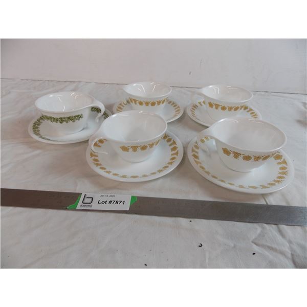 (5) Corelle cup saucers (4 brown, 1 green)