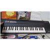 Image 3 : Yamaha portasound PCS-500 Keyboard + music books (working)