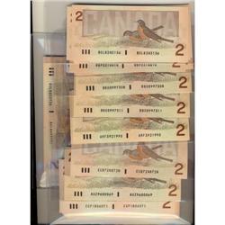 1986 $2. Lot of 229 notes including different pre